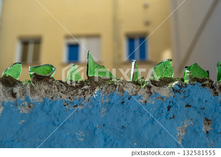 close-up fence with broken glass close-up fence with broken glass 132581555