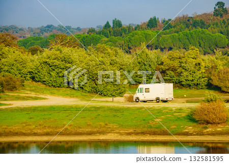 Rv caravan on lake shore. Autumn time. Rv caravan on lake shore. Autumn time. 132581595