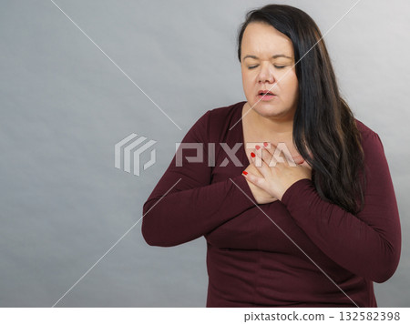 Adult woman having pain in chest 132582398
