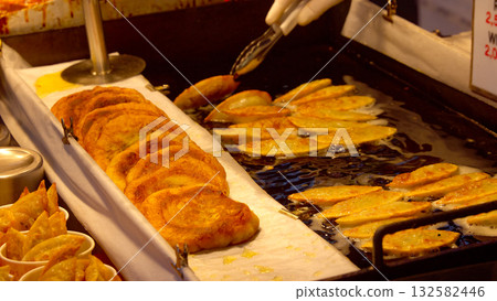 Korean hotteok street food cooking in Seoul 132582446