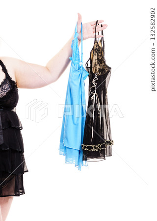 Mature woman choosing sating nightwear 132582902