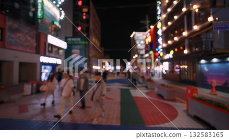 People walking on Hongdae street in Seoul at night 132583165