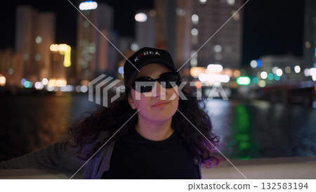 Woman traveling Busan city at night Woman traveling Busan city at night 132583194
