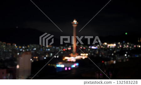 Busan Tower night cityscape with city lights bokeh Busan Tower night cityscape with city lights bokeh 132583228