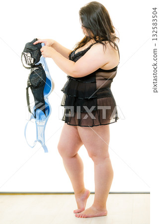 Plus size woman fitting bras Plus size woman fitting bras 132583504