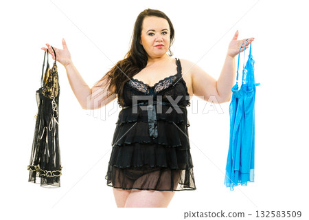 Plus size woman fitting satin nightwear 132583509
