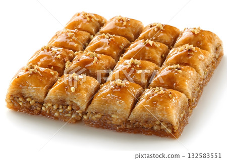 Sweet dessert baklava arranged in rows ready to eat. 132583551