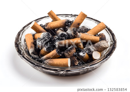 Ashtray holds many used cigarette butts full of ash after smoking. 132583854