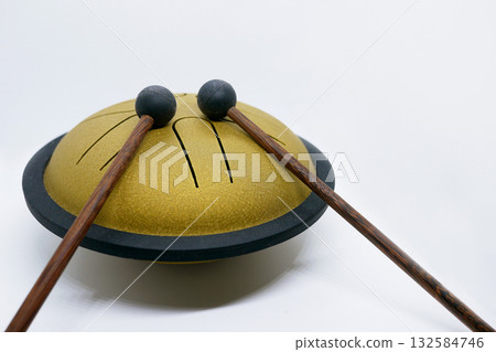 Tongue Drum with Mallets on White Background Tongue Drum with Mallets on White Background 132584746