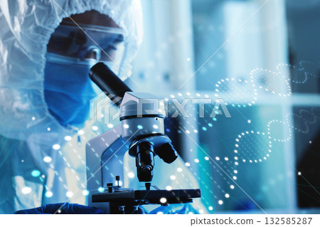 Scientist examining samples closely with microscope in laboratory setting Scientist examining samples closely with microscope in laboratory setting 132585287