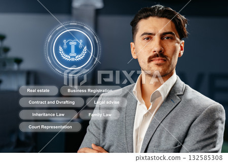 Man in a gray suit confidently discussing legal services in an office setting Man in a gray suit confidently discussing legal services in an office setting 132585308