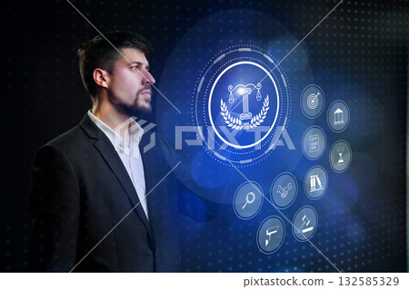 Businessman interacting with digital interface during a modern conference in a city setting 132585329