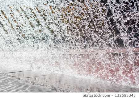 Fountain in the city. Water splashes close-up. Fountain in the city. Water splashes close-up. 132585345