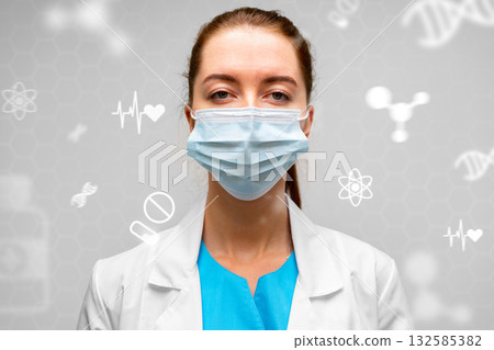 Medical professional wearing mask with health symbols in the background Medical professional wearing mask with health symbols in the background 132585382