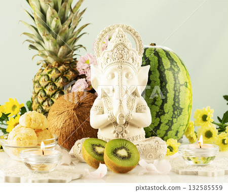 Lord Ganesha , Ganesh festival. Holiday of Ganesh Chaturthi. Sculpture of ganesha with offerings, fruits, sweets, flowers and candles on a light background. Hindu religion holiday. Soft focus style 132585559