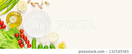 Healthy food banner with organic, farm vegetables and empty white plate on a white background with copy space. The concept of vegan food and detox. Ingredients for vegetables salad. Banner size Healthy food banner with organic, farm vegetables and empty white plate on a white background with copy space. The concept of vegan food and detox. Ingredients for vegetables salad. Banner size 132585565