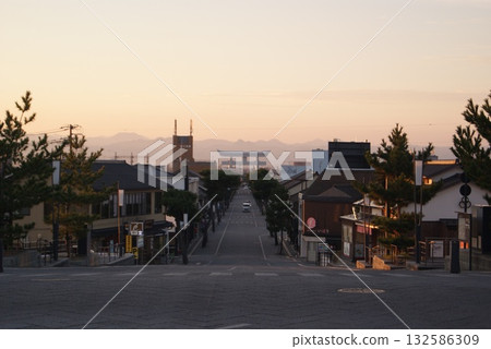 The silhouette of the Izumo Taisha Shrine's large torii gate floating over the approach to the shrine 132586309