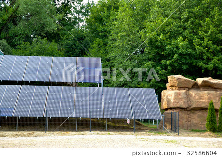 House roof with photovoltaic modules. Historic farm house with modern solar panels on roof and wall High quality photo House roof with photovoltaic modules. Historic farm house with modern solar panels on roof and wall High quality photo 132586604