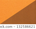 Textured craft orange and brown paper background, half two colors. Vintage tan cardboard with copy space 132586621