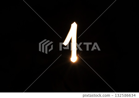 Way to success and leadership concept. Light painting number one entry in empty dark background. Labor Day, New Year, New Start. Way to success and leadership concept. Light painting number one entry in empty dark background. Labor Day, New Year, New Start. 132586634