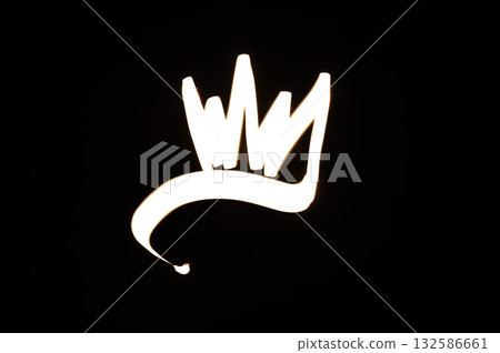 Light painting for Epiphany Day or Dia de Reyes Magos concept. Gold crowns, Star on black background 132586661