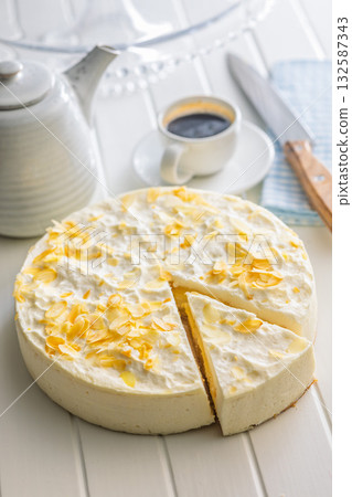 Sweet creamy cake on white table. Sweet creamy cake on white table. 132587343