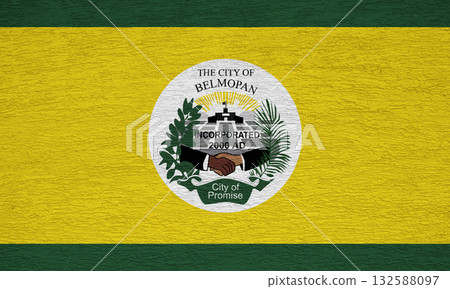 The official flag of Belmopan, the capital of Belize, on a plaster wall texture. Conceptual collage The official flag of Belmopan, the capital of Belize, on a plaster wall texture. Conceptual collage 132588097