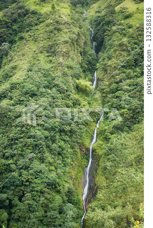 Mountain covered with tropical forest with waterfall, Ecuador. Mountain covered with tropical forest with waterfall, Ecuador. 132588316