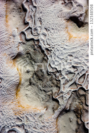 Abstract textured surface resembling alien landscape or mineral deposit. Natural patterns, stone, salt,and erosion Backgrounds, geology, nature theme Abstract textured surface resembling alien landscape or mineral deposit. Natural patterns, stone, salt,and erosion Backgrounds, geology, nature theme 132588508