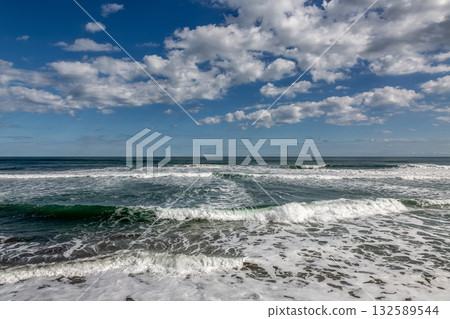 A refreshing seascape of blue skies, clouds, and waves [Pacific Ocean] 132589544