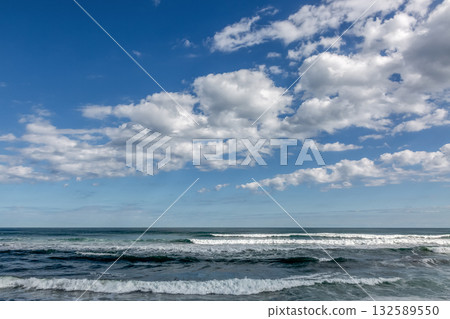 A refreshing seascape of blue skies, clouds, and waves [Pacific Ocean] 132589550