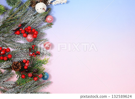 Beautiful Christmas and New Year background with lights, decorations, toys with fir branches with place for text. Holiday card, banner on screen, product setup for holiday advertising, Beautiful Christmas and New Year background with lights, decorations, toys with fir branches with place for text. Holiday card, banner on screen, product setup for holiday advertising, 132589624