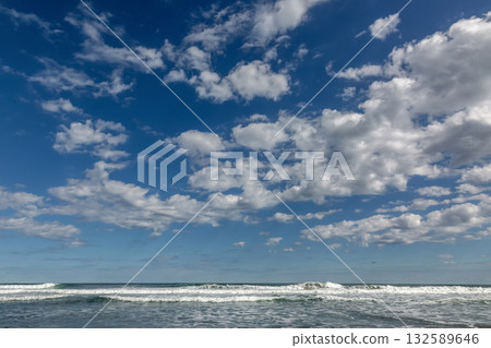 A refreshing seascape of blue skies, clouds, and waves [Pacific Ocean] 132589646