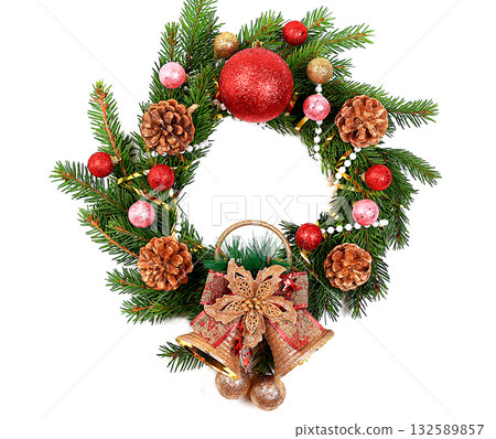 Christmas wreath made of live fir branches and toys on a white background, template for design, concept of Christmas and New Year's Eve, banner for content advertising . New Year card, 132589857