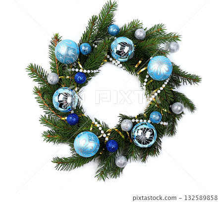 Christmas wreath made of live fir branches and toys on a white background, template for design, concept of Christmas and New Year's Eve, banner for content advertising . New Year card, 132589858