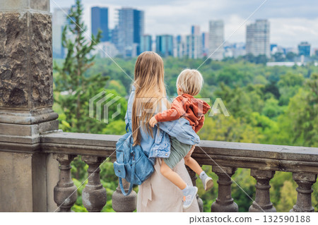 Mother with her young son near Chapultepec Castle in Mexico City, enjoying a cultural family trip. Parenthood, love, heritage sightseeing, and family bonding travel concept Mother with her young son near Chapultepec Castle in Mexico City, enjoying a cultural family trip. Parenthood, love, heritage sightseeing, and family bonding travel concept 132590188