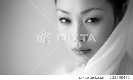 Monochrome female portrait that combines serenity and beauty 132590471