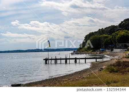Lake Hamana in autumn, Osaki, pier and windsock, Hamamatsu City, Shizuoka Prefecture Lake Hamana in autumn, Osaki, pier and windsock, Hamamatsu City, Shizuoka Prefecture 132594344