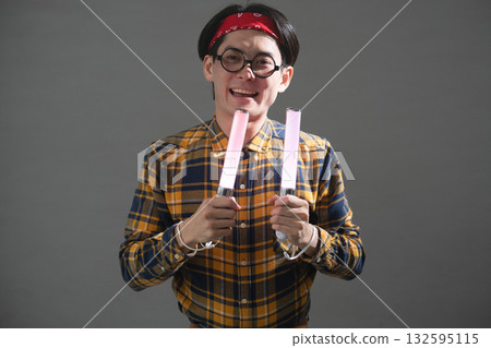 Young man wearing checked clothes 132595115