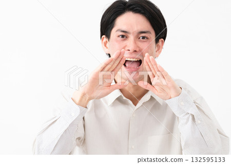 Young man wearing a long-sleeved white shirt Young man wearing a long-sleeved white shirt 132595133