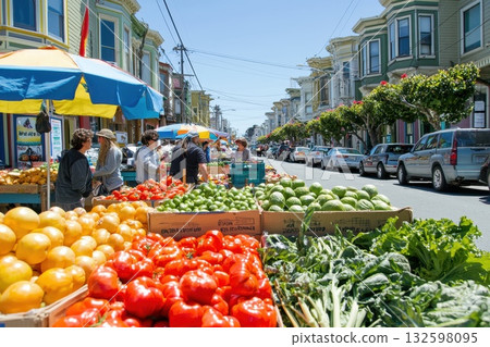 Vibrant Farmers Market with Fresh Produce in Urban Neighborhood Under Clear Blue Sky 132598095