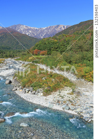 Mt. Hakuba seen from Hakuba Bridge in autumn Mt. Hakuba seen from Hakuba Bridge in autumn 132598403