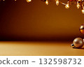 Christmas ornaments and lights on golden background 132598732