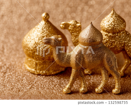 Golden Camel and Dome Figurines on Glitter Surface Golden Camel and Dome Figurines on Glitter Surface 132598735