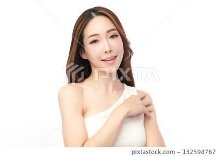 A beautiful young Asian woman with clean, fresh skin against a white background. Skincare, facial treatment, cosmetology, beauty, and spa. An elegant portrait of an Asian woman. A beautiful young Asian woman with clean, fresh skin against a white background. Skincare, facial treatment, cosmetology, beauty, and spa. An elegant portrait of an Asian woman. 132598767