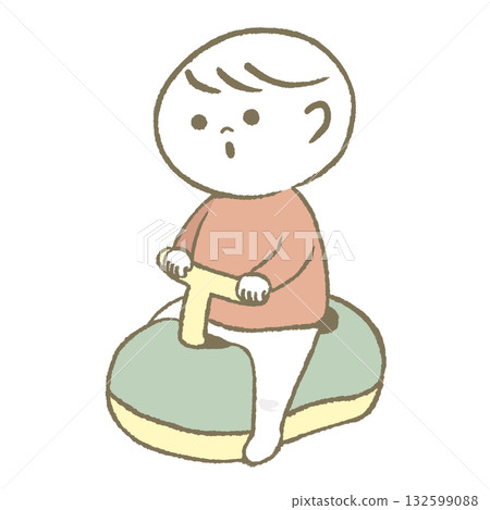 A child sitting in a caterpillar A child sitting in a caterpillar 132599088