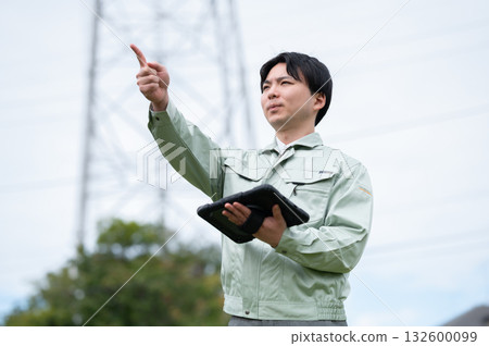 Young employees of a power transmission construction company 132600099