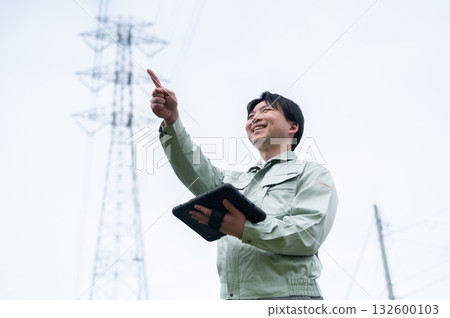 Young employees of a power transmission construction company Young employees of a power transmission construction company 132600103