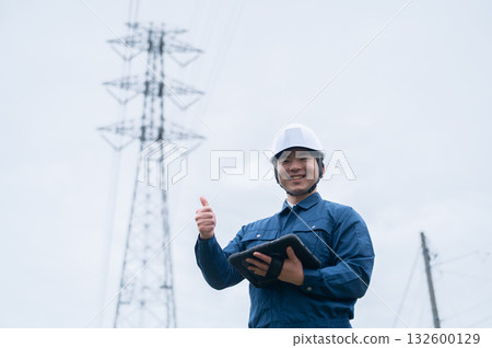 Young employees of a power transmission construction company 132600129