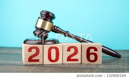 Gavel resting on 2026 blocks symbolizing legal changes coming in the near future, awaiting the future of law and order Gavel resting on 2026 blocks symbolizing legal changes coming in the near future, awaiting the future of law and order 132600184